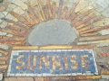 Sunrise Inc. walkway to office Sign